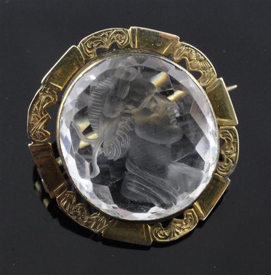 A 19th century engraved gold mounted intaglio rock crystal oval brooch, 29mm.